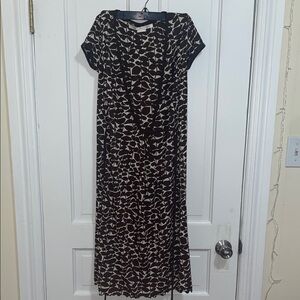 Elegant Black and Cream Patterned Wrap Dress